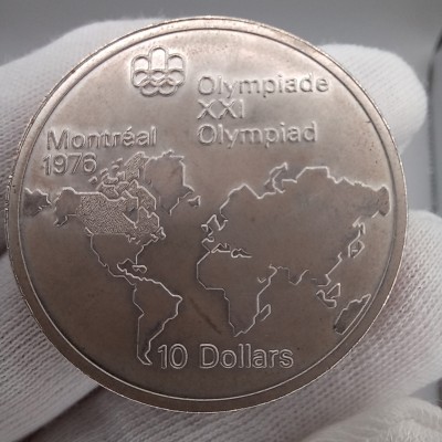 10 долларов 1973 год. Канада. XXI летние Олимпийские Игры, Монреаль 1976 - Карта мира